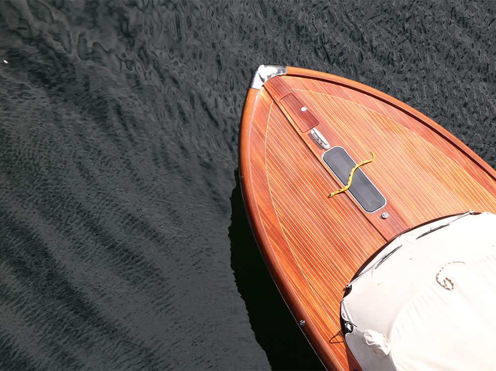 A picture of the wooden front of a yacht.
